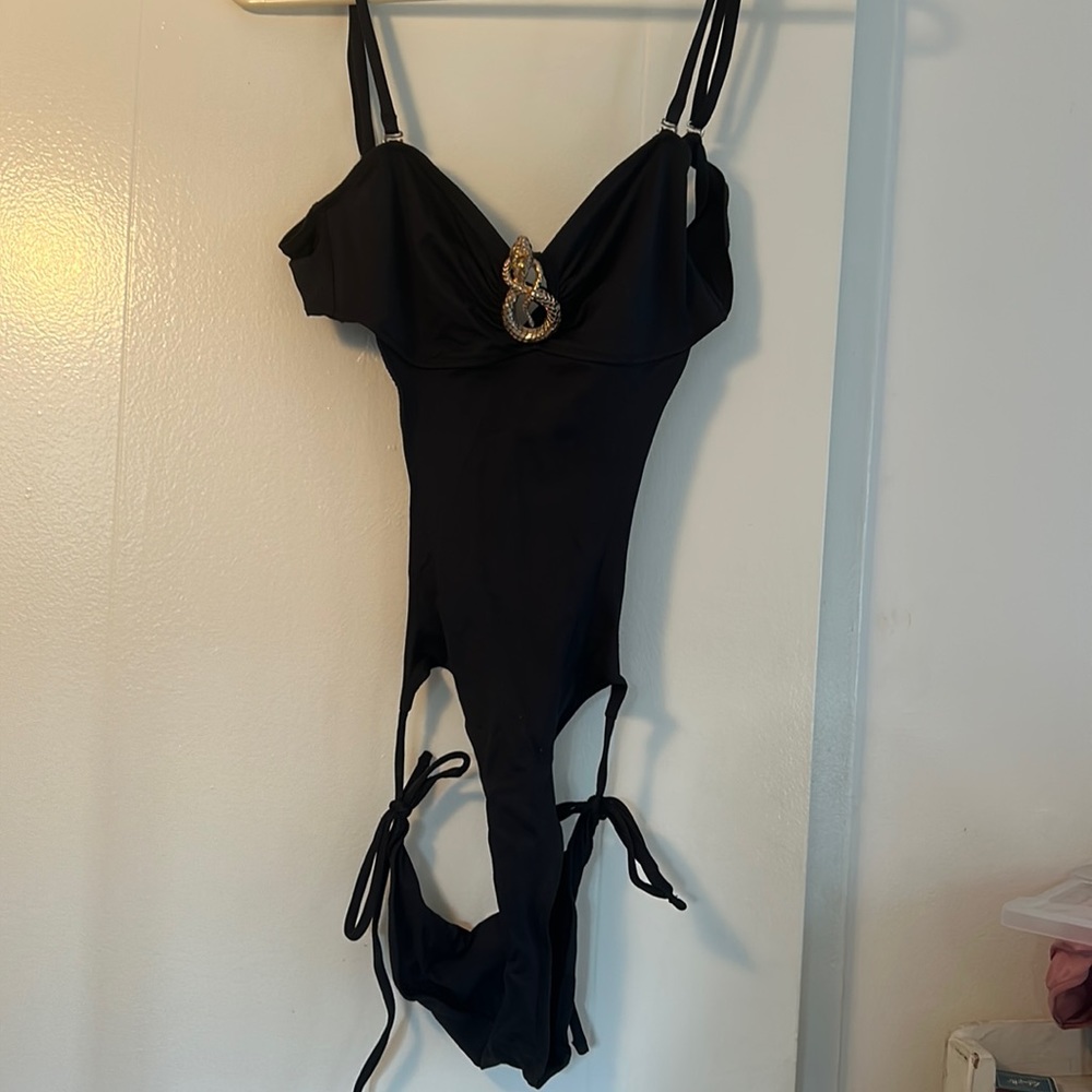 Black vintage one piece bathing suit with golden snake jewel on the bra